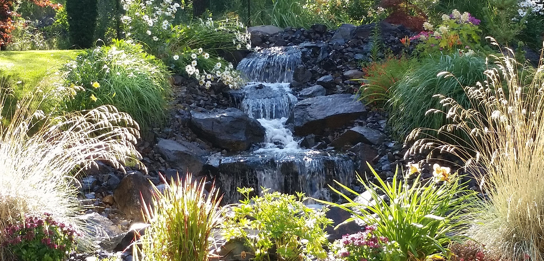 Backyard water feature and landscaping project completed in Spokane, Washington